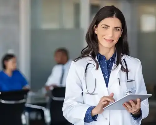 portrait-of-beautiful-mature-woman-doctor-holding-digital-tablet-and